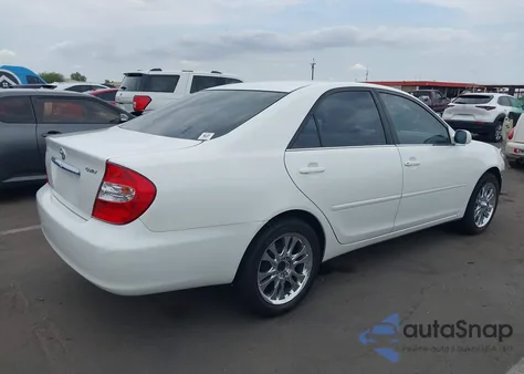 2004 Toyota Camry Le from USA, damaged, VIN JTDBE30K540261028
